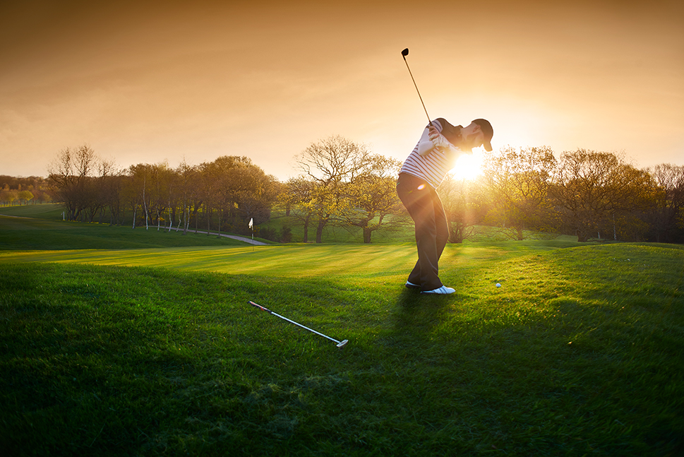 Golfer enjoying the game on a quiet golf course. Customize a specialty vacation package to match your interests. 
