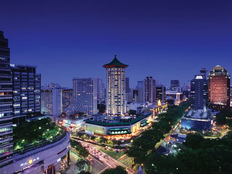 Night view of JW Marriott Shanghai showcasing the city skyline.