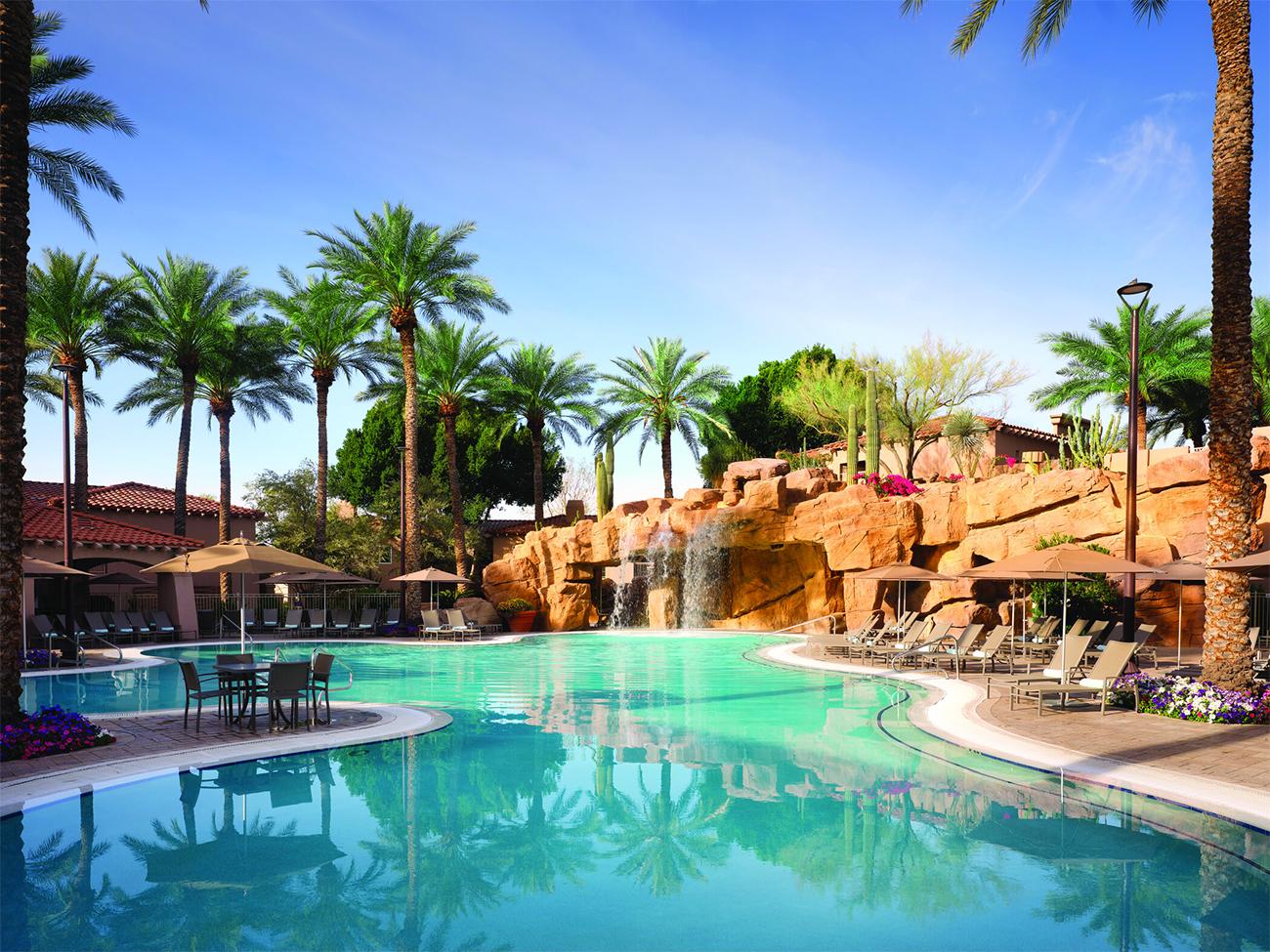 Pool grotto lined with rock waterfalls at the Sheraton Desert Oasis resort timeshare